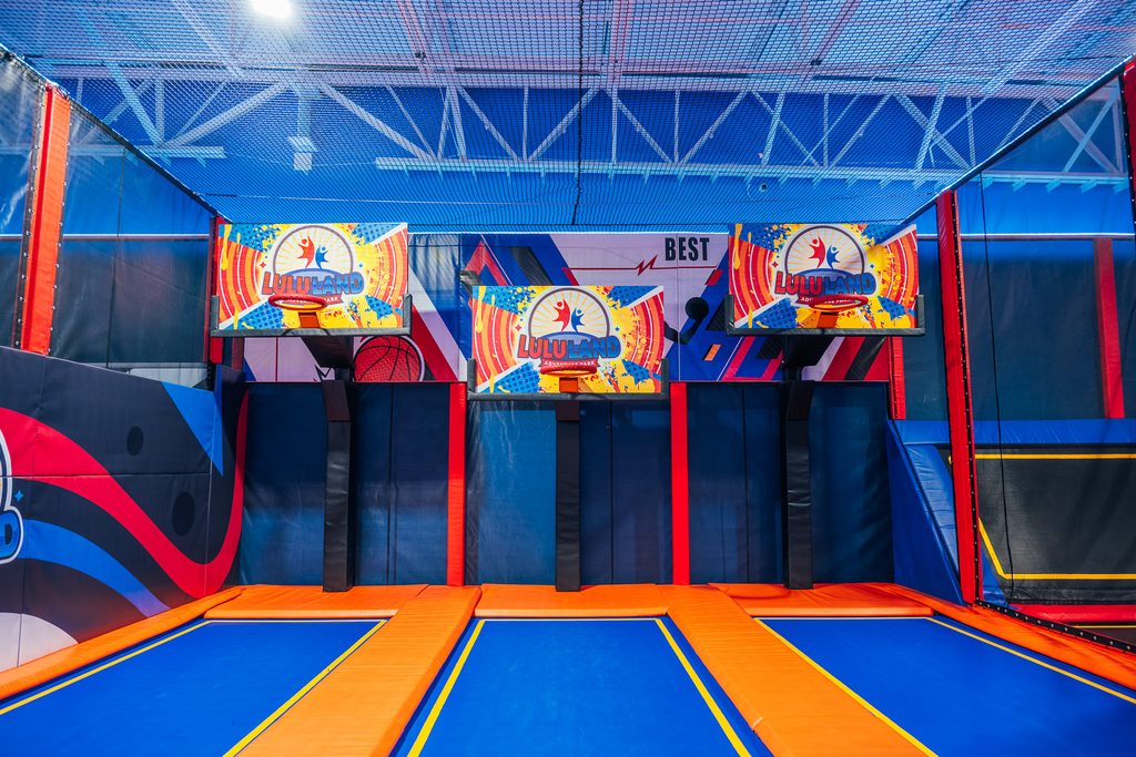 Basketball dunk courts at lululand. Goals are on the wall and the floor is the trampline