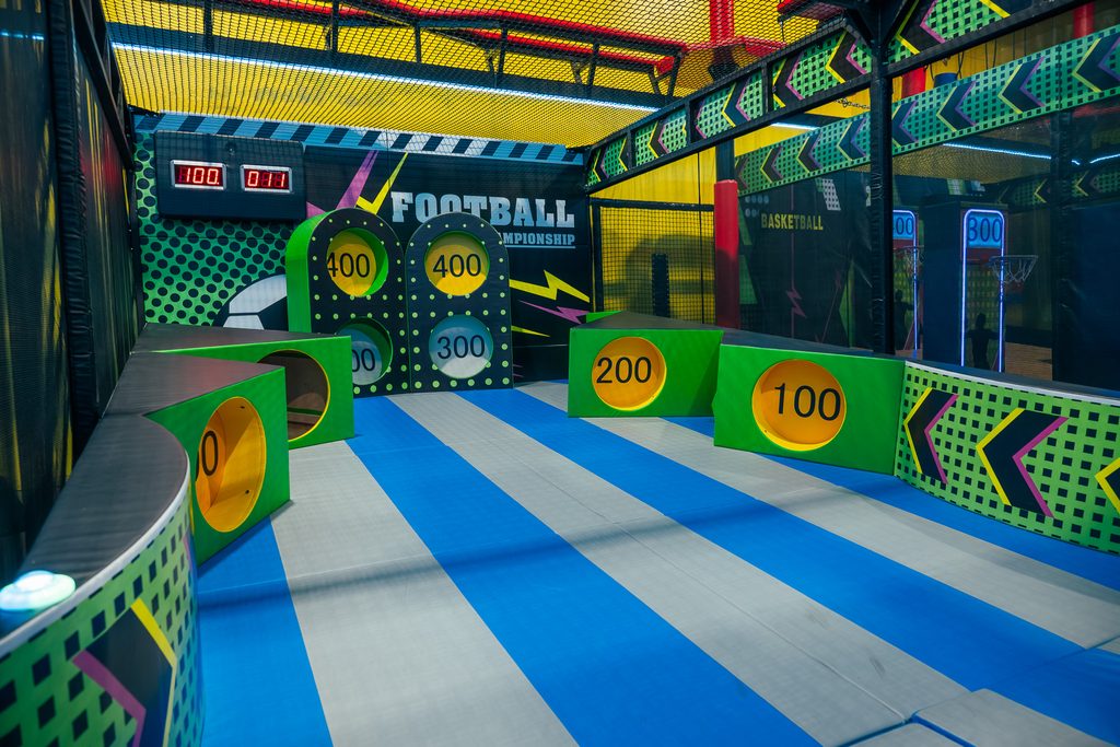 Football championship area where kids can hit targets and rack up points on the digital scoreboard
